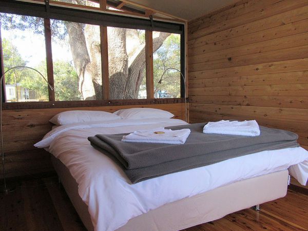 Minjerribah Camping EcoShacks Logo and Images
