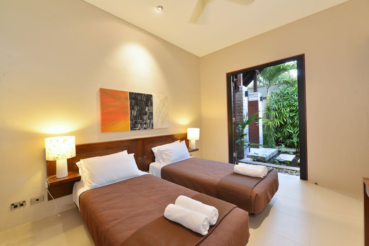 Niramaya Villas & Spa Logo and Images