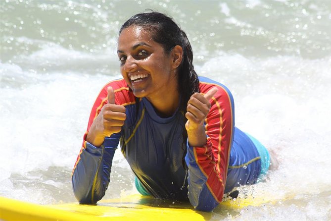 Surfing Lesson at Cheyne Horan School of Surf on the Gold Coast Logo and Images