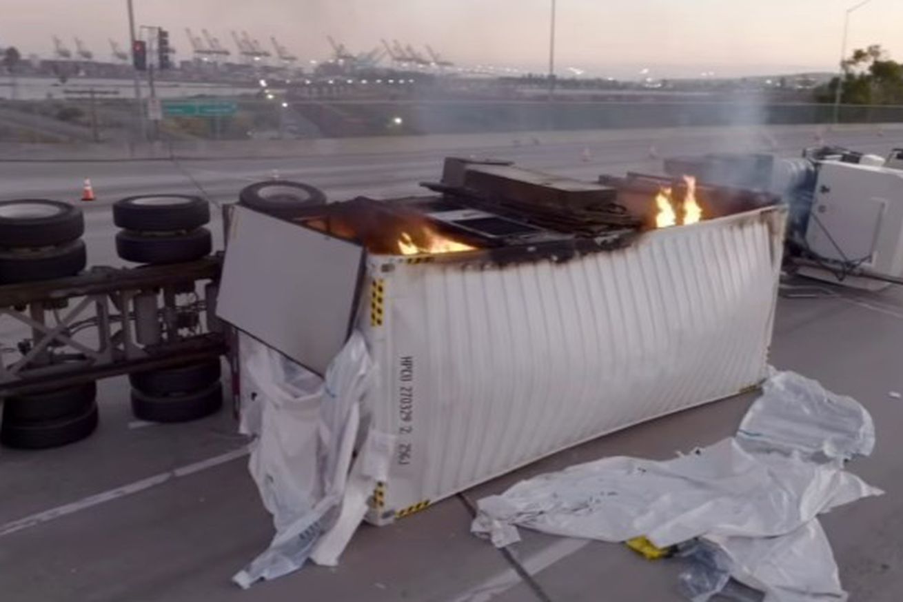 A truck full of batteries has been burning for almost a full day, shutting down ports in LA