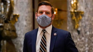 Eric Swalwell claims ICE agents are running around 'like masked bank robbers terrorizing women'