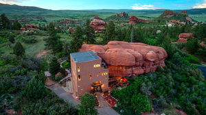 This $1M 'Flintstones'-style home built into ancient red rock could be yours